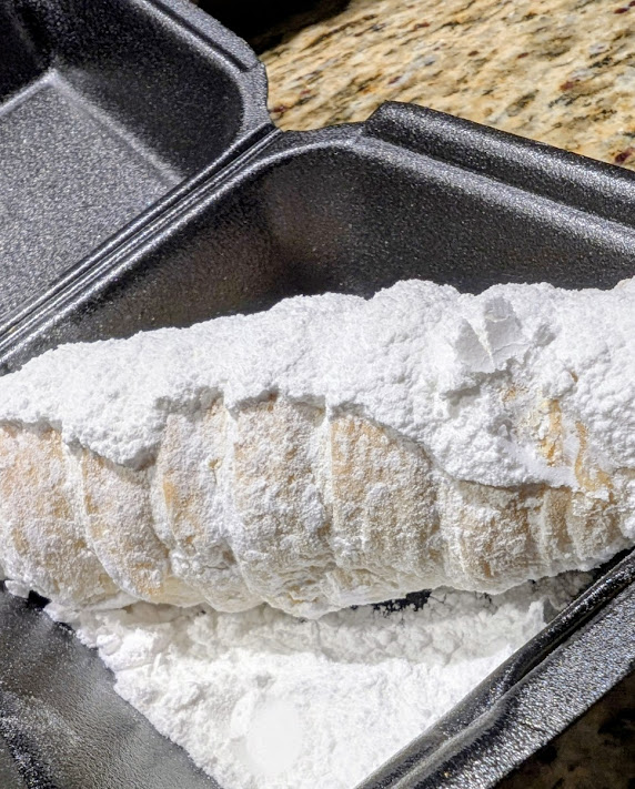 Powdered sugar dessert roll